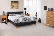 Tivolin Bed In Black Faux Leather With Wooden Legs