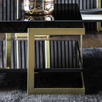 Amana Glass Top Coffee Table With Golden Metal Frame In Black