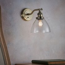 Hansen Clear Glass Shade Wall Light In Antique Brass