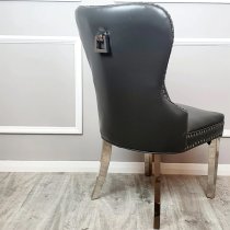 Marina Dark Grey Faux Leather Dining Chairs In Pair